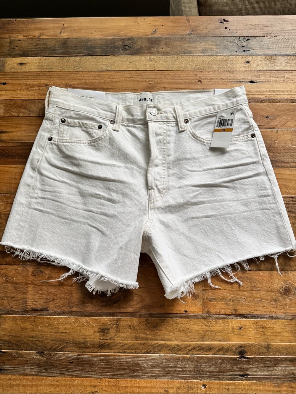 NWT Agolde Parker Long Jean Shorts in Panna Cotta.